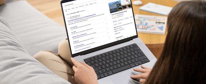 A person on a computer checking their NAP consistency for Google.