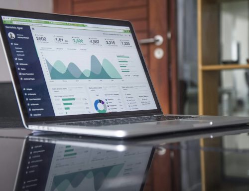 Laptop displaying marketing analytics dashboard with graphs and data metrics, reflecting insights for effective marketing attribution and growth strategies.